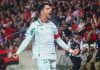 Palmeiras terá desfalques de dois titulares na partida contra Red Bull Bragantino em Barueri Jogador do Palmeiras comemora gol durante partida de futebol, representando Piquerez conforme a fonte.
