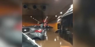 Especialista da USP destaca que enchentes em São Paulo decorrem da falta de preparo urbano, não apenas da chuva Túnel do Anhangabaú inundado após forte chuva em São Paulo em outubro de 2026, mostrando veículos parcialmente submersos e pessoas sobre carros ilhadas pela água